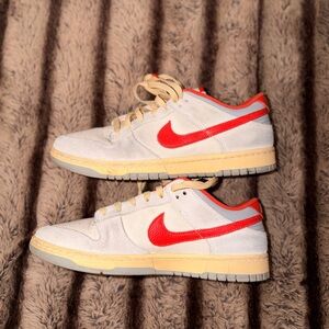 Nike Dunk Low “Athletic Department” in Sail/Picante Red